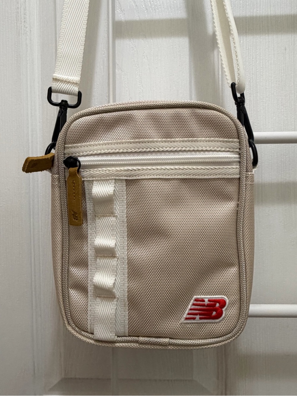 New Balance Cream-Beige Mini Messenger Bag with Red Logo